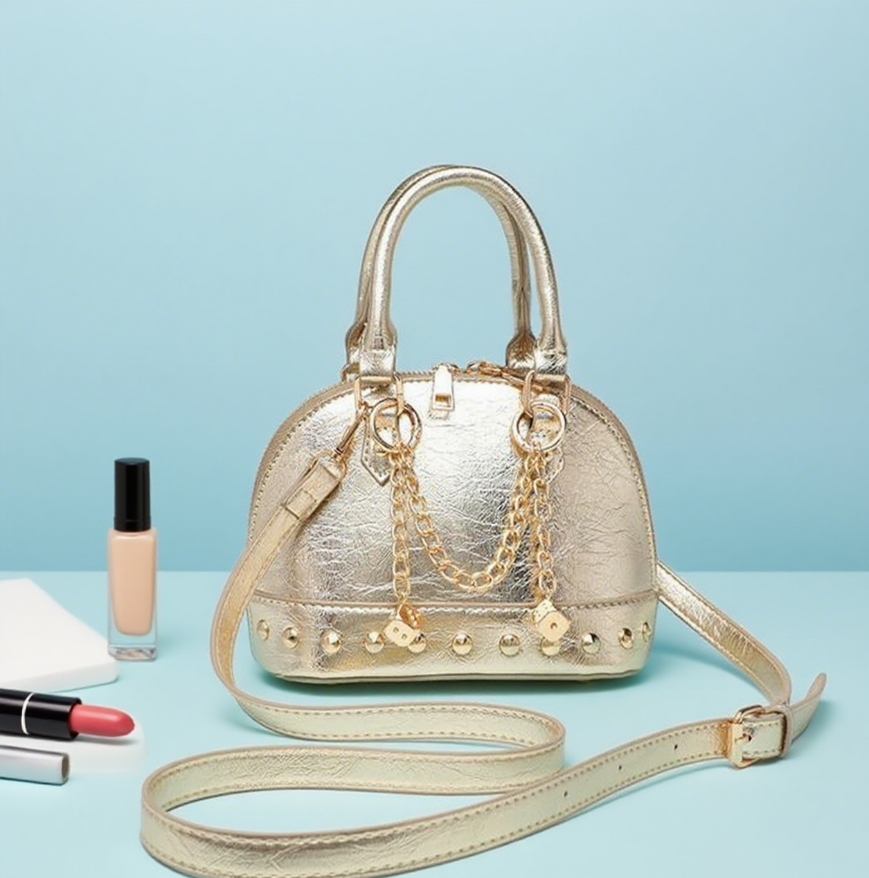 Shiny studded shell mini crossbody bag